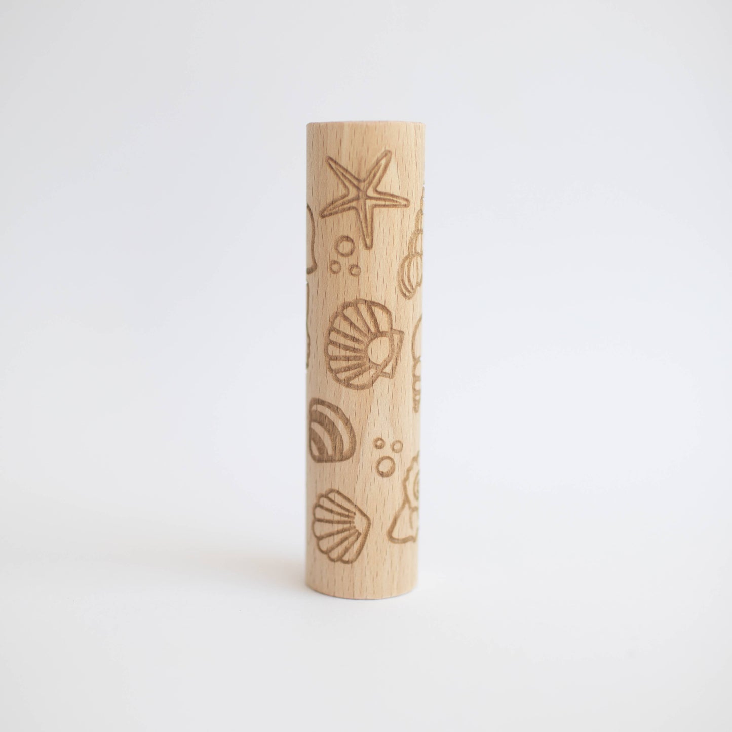 Rullo di legno con motivi a conchiglie